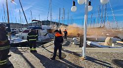 Esplosione e incendio su una barca, un ferito: allarme al porto, ma era un'esercitazione