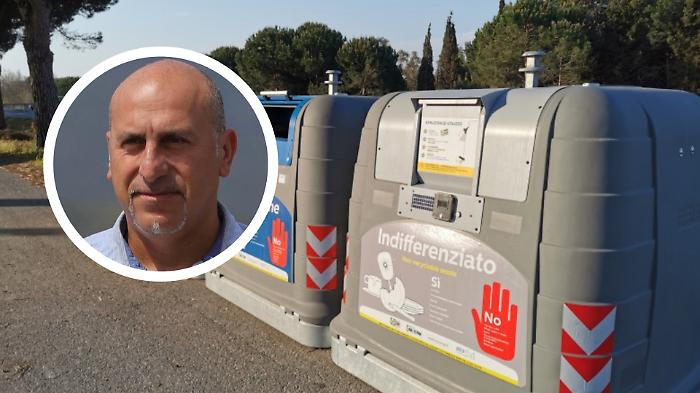 Cassonetti dei rifiuti e assessore Ivan Poccia